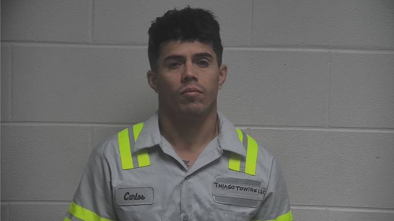 Booking photo of Carlos Dennier Torrenz Espinosa