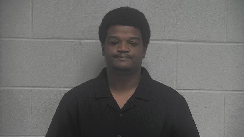 Booking photo of Claudy Louissaint