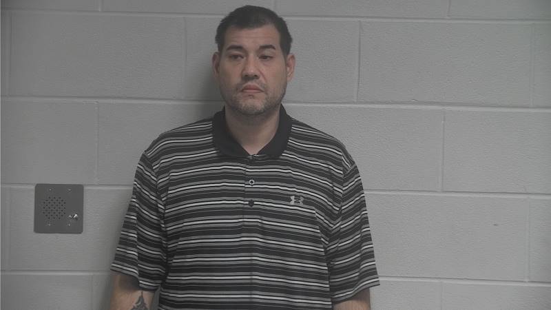 Booking photo of Michael Raines