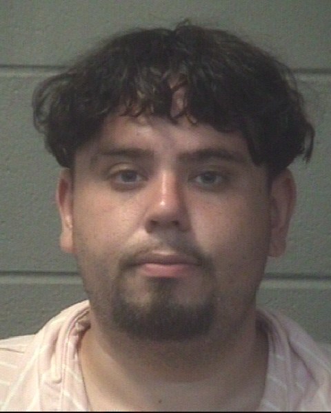 Booking photo of Aaron Wiggs
