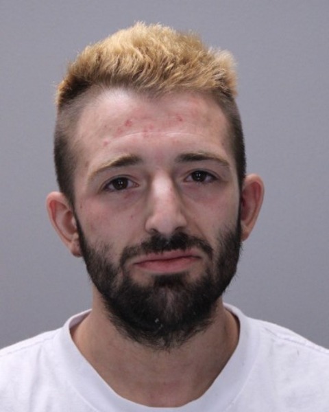 Booking photo of Stephen Topoliuk