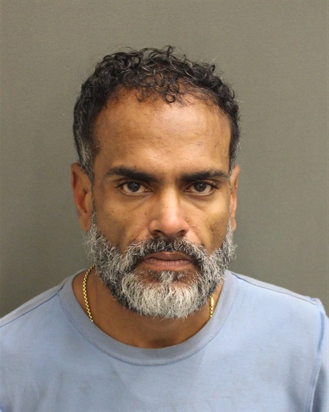Booking photo of Carlos Cadiz