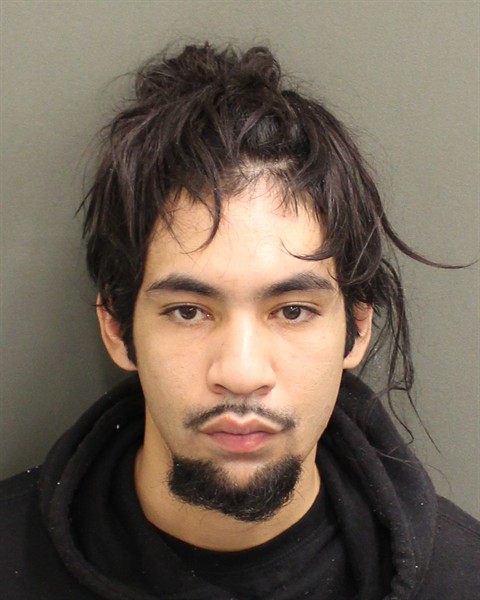 Booking photo of Miguel Cotto