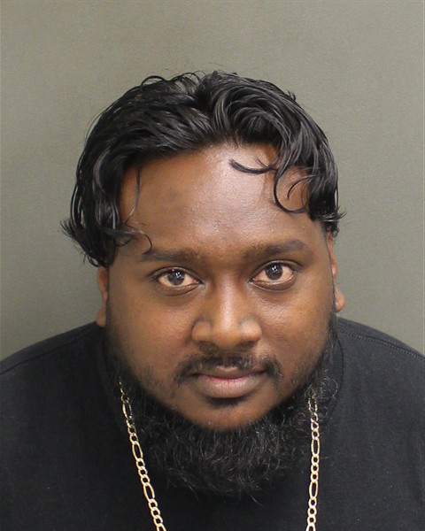 Booking photo of Clinton Babwah