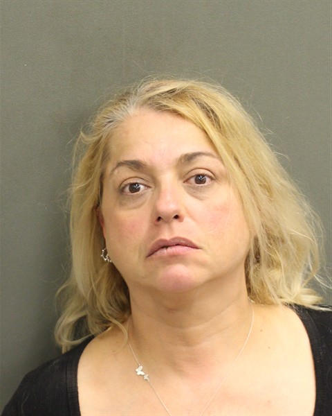 Booking photo of Michele Harmon