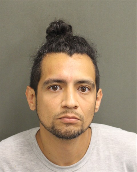 Booking photo of Maximo Flores