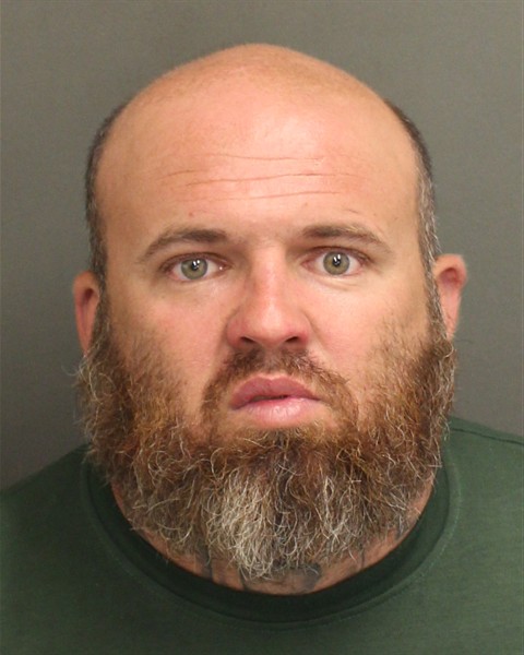 Booking photo of Brandon Cox