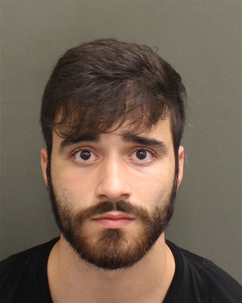 Booking photo of Kuan Caetanolima