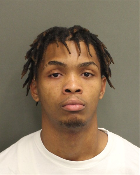 Christian Sylvain booking photo