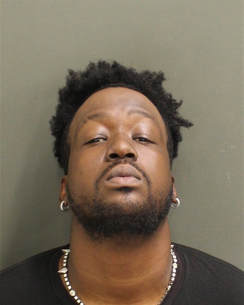 Booking photo of Romario Colin