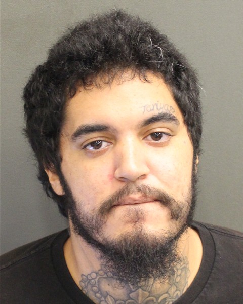 Booking photo of Angelo Grullon
