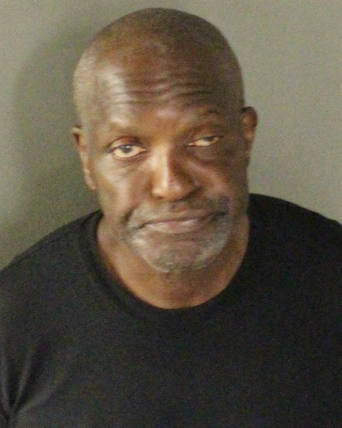 Booking photo of James Woods