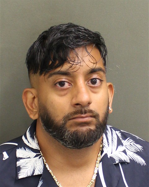 Booking photo of Ricky Asrula