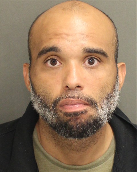 Booking photo of Cameron Burgest