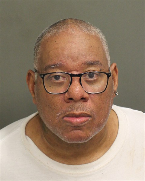 Booking photo of John Rogers