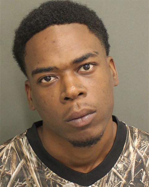 Booking photo of Jraveus Akins