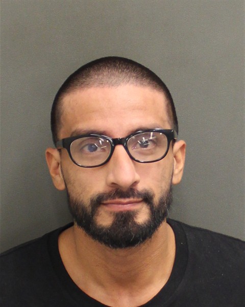 Booking photo of Edgar Toledo