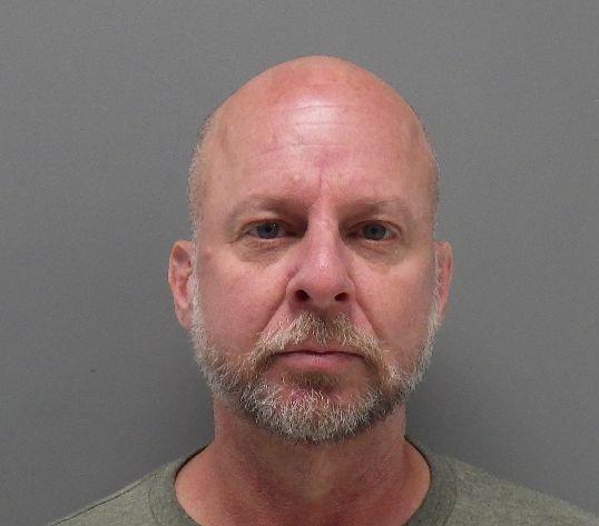 Booking photo of Christopher Mouton