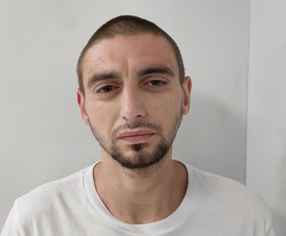 Booking photo of Kyle Holcomb
