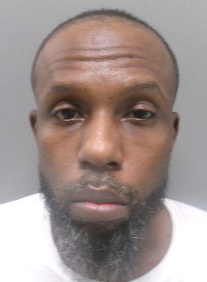 Booking photo of Tom Woods