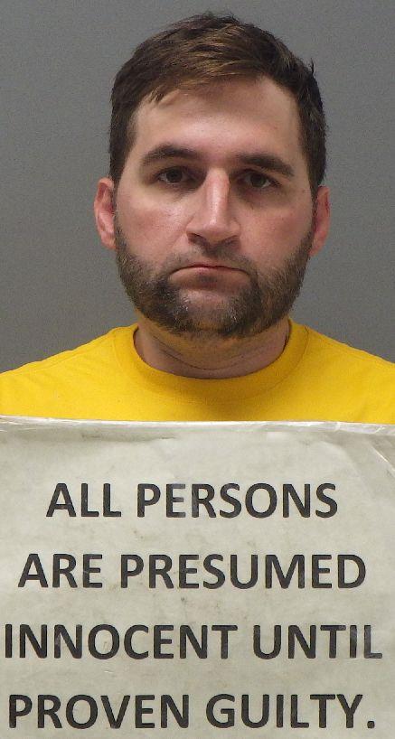 Booking photo of Scott Andrews