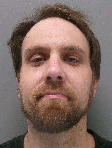 Booking photo of John Thomas