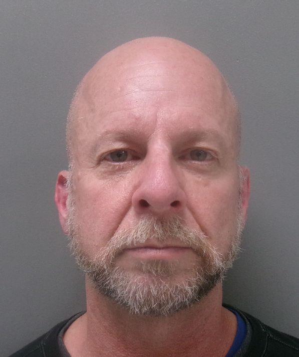 Booking photo of Christopher Mouton