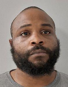 Booking photo of Johnny Cooper