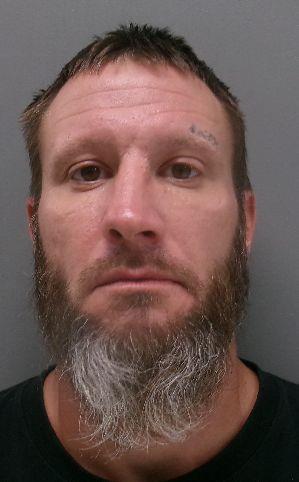 Booking photo of Darren West