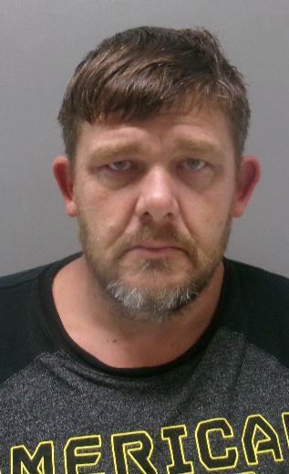 Michael Moore booking photo