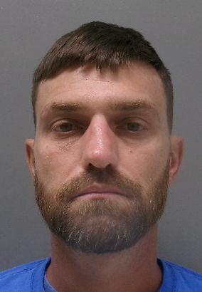 Booking photo of Michael Evans