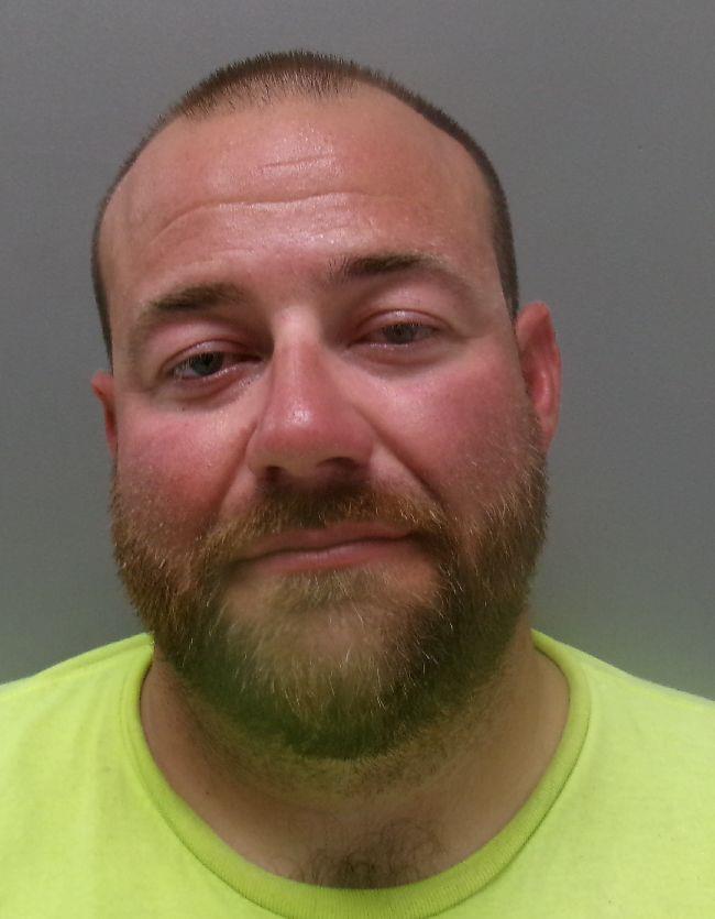 Booking photo of Travis Brown
