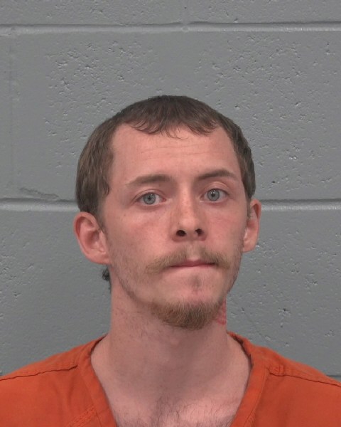 Booking photo of Michael Rhoades