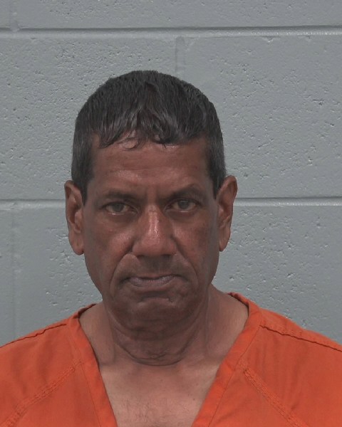 Booking photo of Mitra Dharam