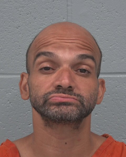 Booking photo of Michael Colon