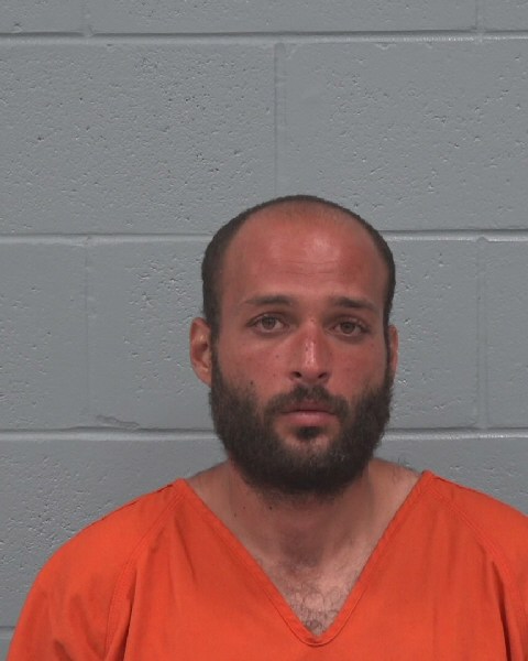 Booking photo of Waleed Mubarak