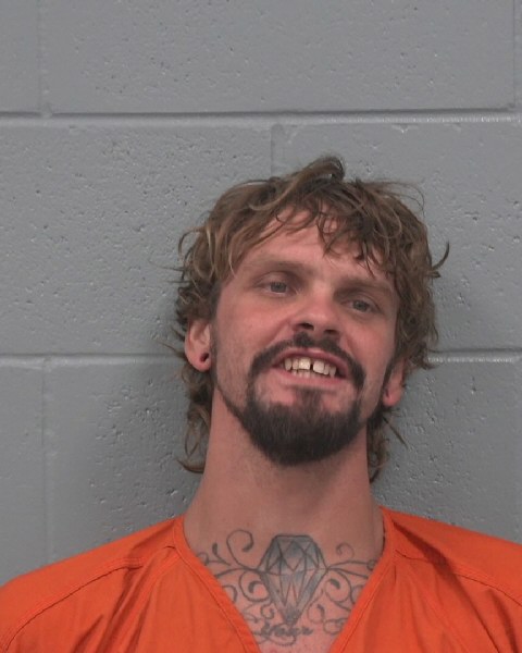 Booking photo of Dustin Miller