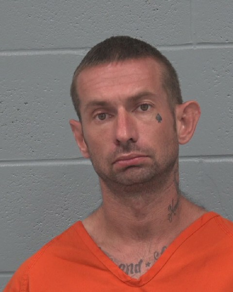 Booking photo of Travis Yindra