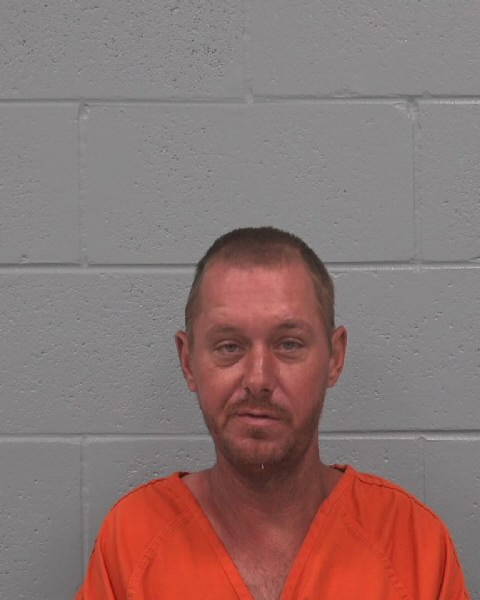 Booking photo of Clarence Brewster