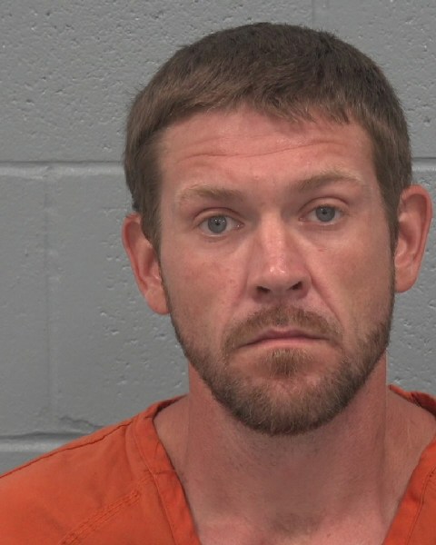 Booking photo of Johnny Sisum