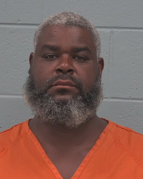 Booking photo of Michael James