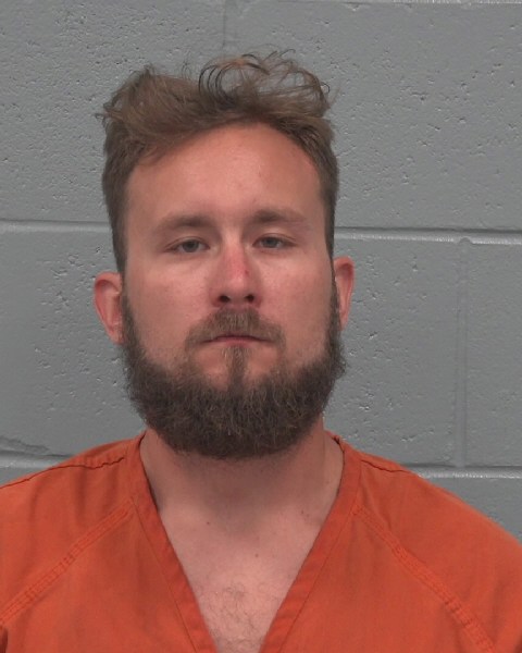 Booking photo of Caleb Thomeczek