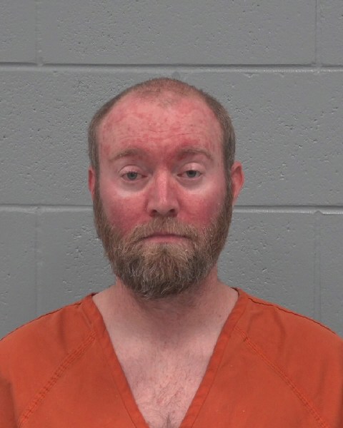 Booking photo of Brett Thompson