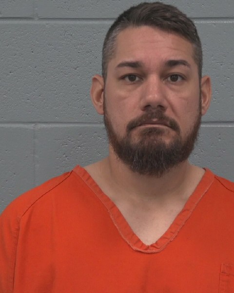 Booking photo of Derek Eva