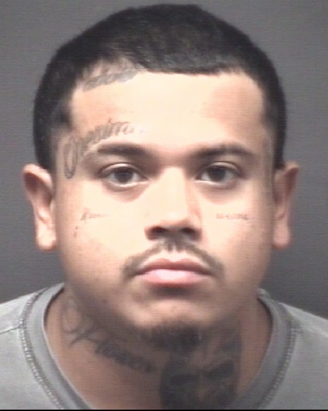 Booking photo of Eric Flores-mora