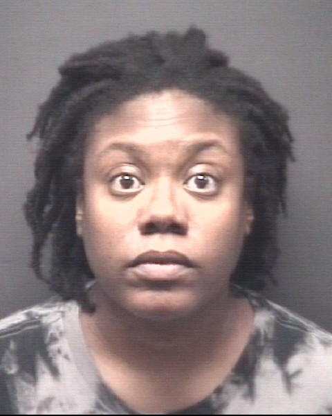 Booking photo of Alexis Neil