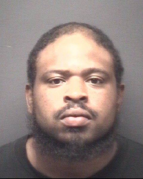 Booking photo of David Moore Jr
