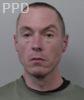 Booking photo of Russell Mcmanus