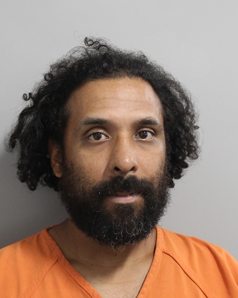 Booking photo of Miguel Caez Jr.