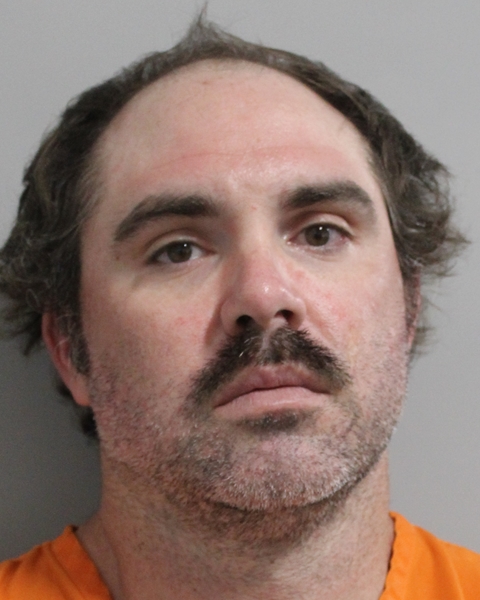 Booking photo of John Cooley